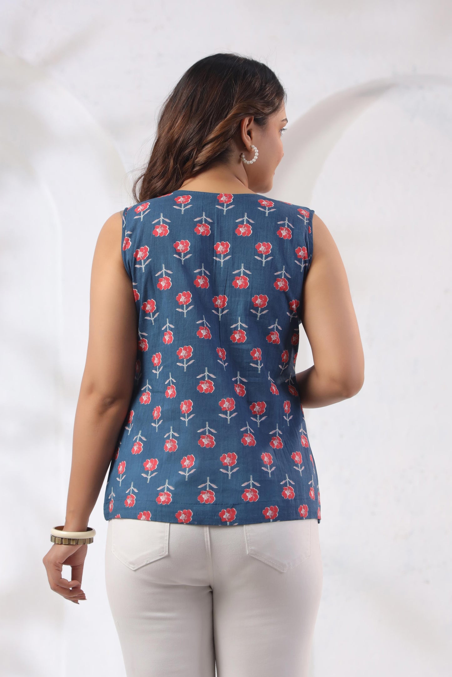 Back view of GulBloom Indigo Petal Cotton Sleeveless V-neck Top in indigo blue – Karpaa women's ethnic wear