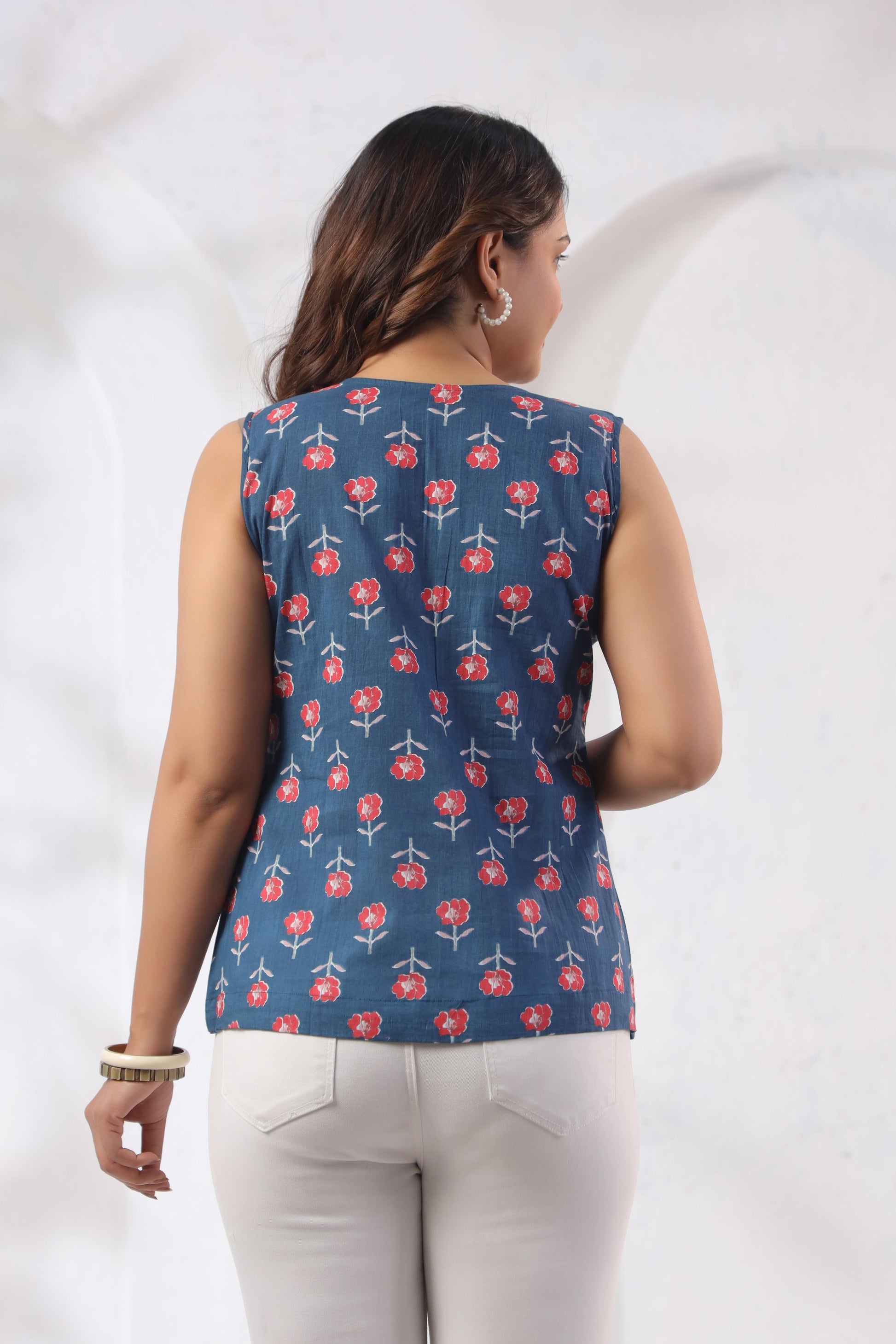 Back view of GulBloom Indigo Petal Cotton Sleeveless V-neck Top in indigo blue – Karpaa women's ethnic wear