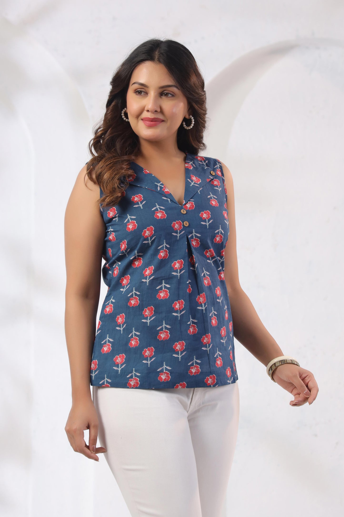 GulBloom GulBloom Indigo Petal Printed Cotton Sleeveless Top in indigo blue with botanical petal print – front view