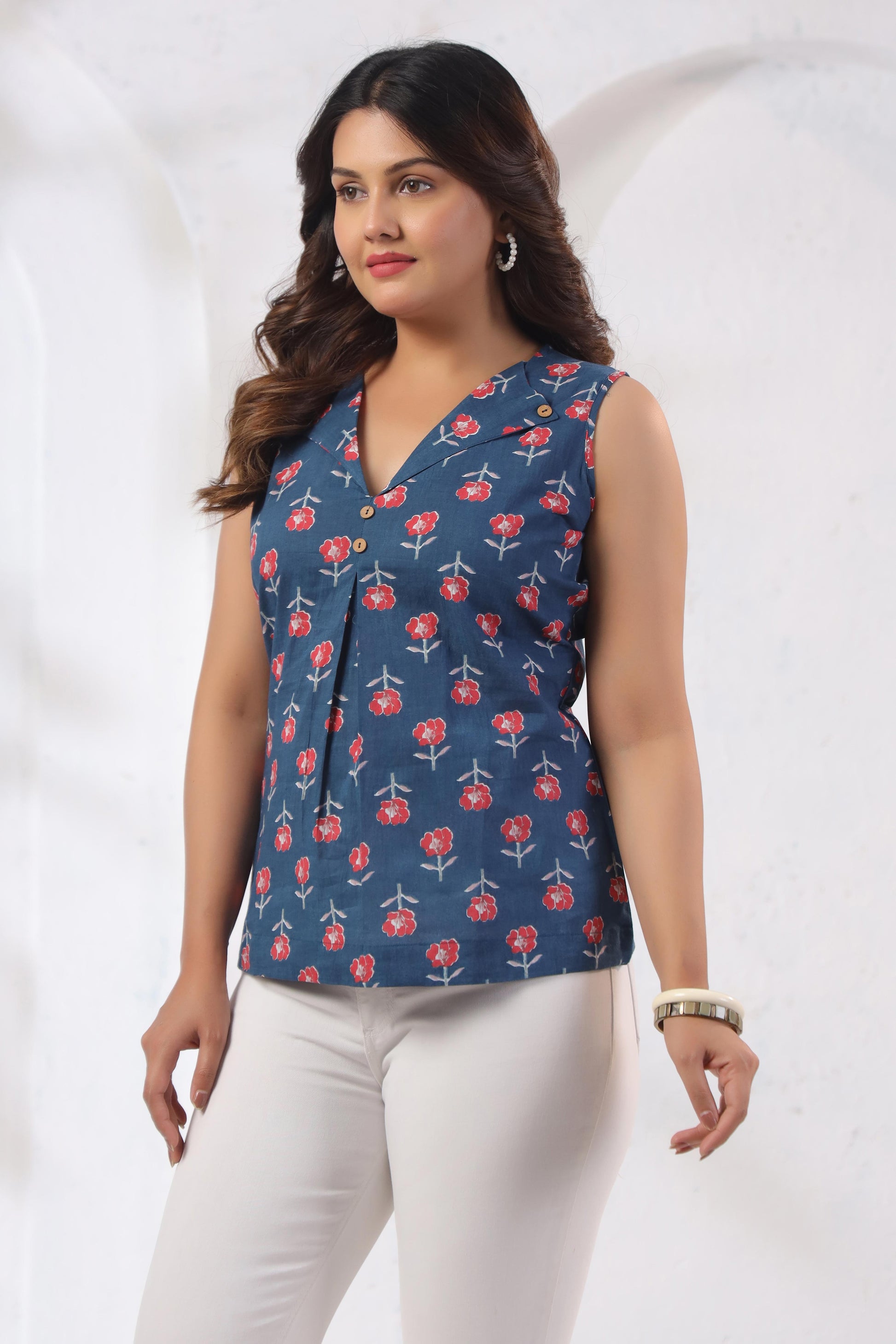 GulBloom GulBloom Indigo Petal Printed Cotton Sleeveless Top in indigo blue with botanical petal print – front view