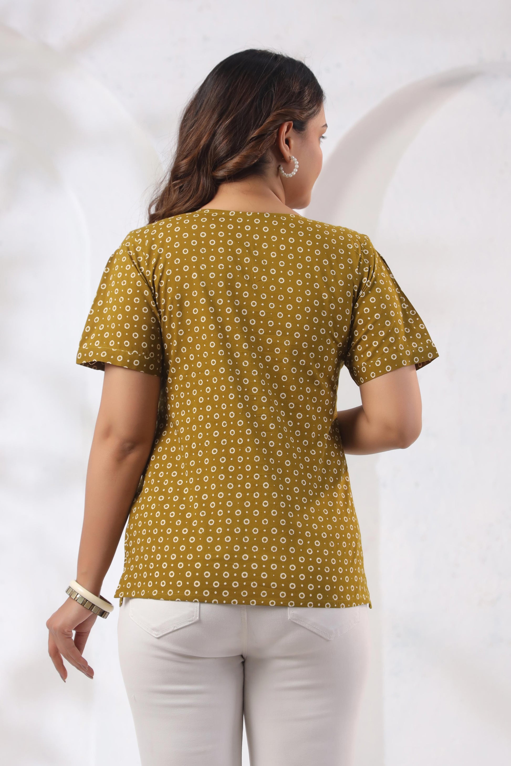 Back view of Noor Aura Amber Dot Printed Cotton Top in amber brown – relaxed fit half sleeve top, Karpaa