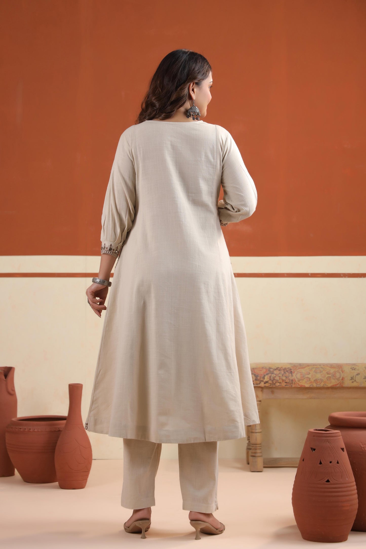 Back view of Rang Ease Desert Charm full sleeve straight-cut kurta set in desert beige with side pockets – Karpaa.in