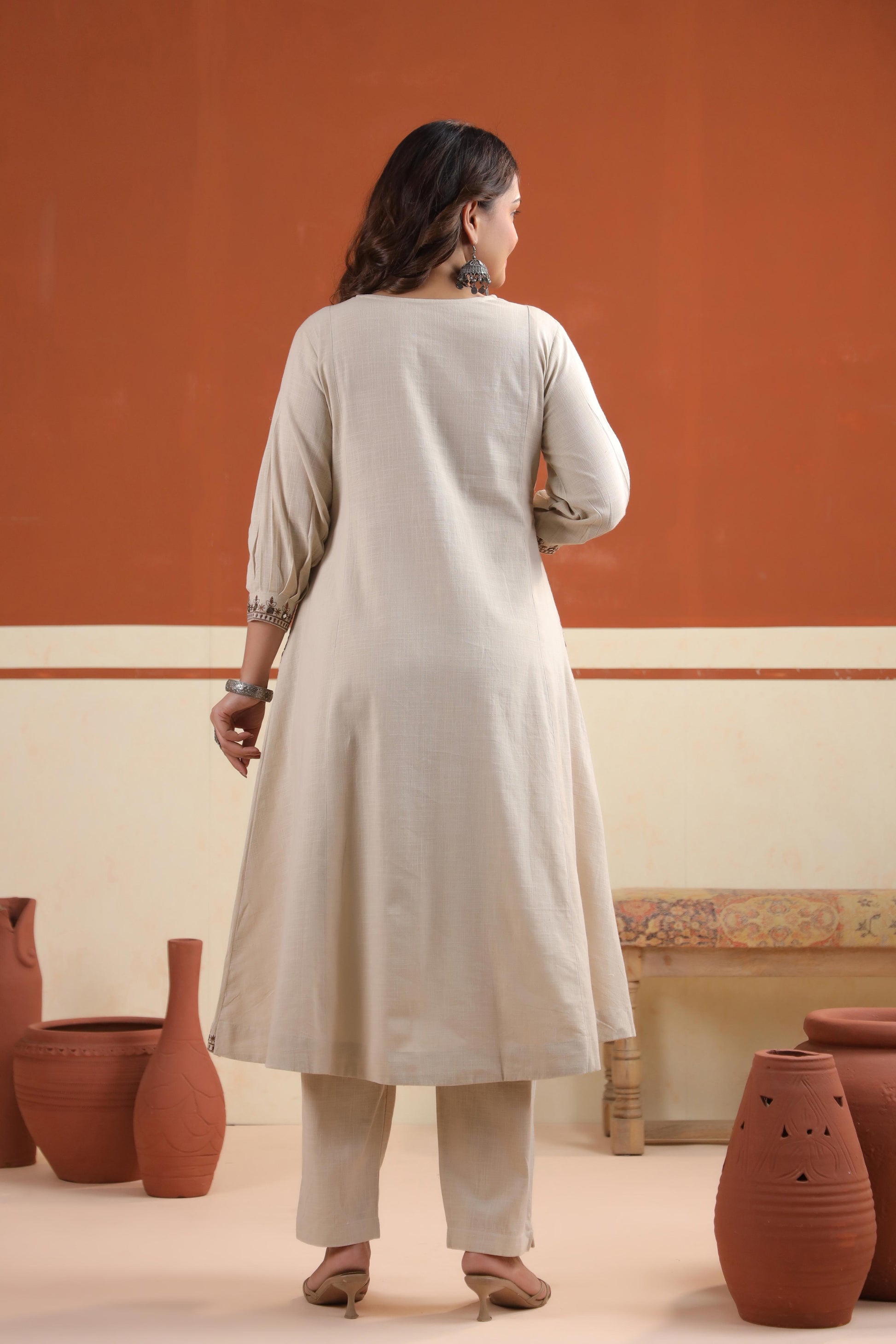 Back view of Rang Ease Desert Charm full sleeve straight-cut kurta set in desert beige with side pockets – Karpaa.in