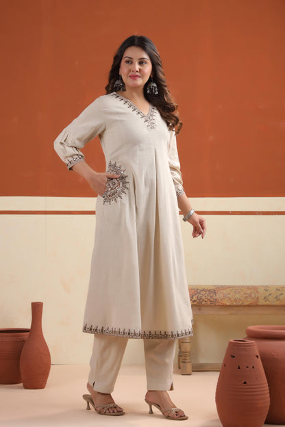 Rang Ease Desert Charm beige embroidered cotton kurta set with straight-cut pant, collar neckline and floral motif front panel – Karpaa